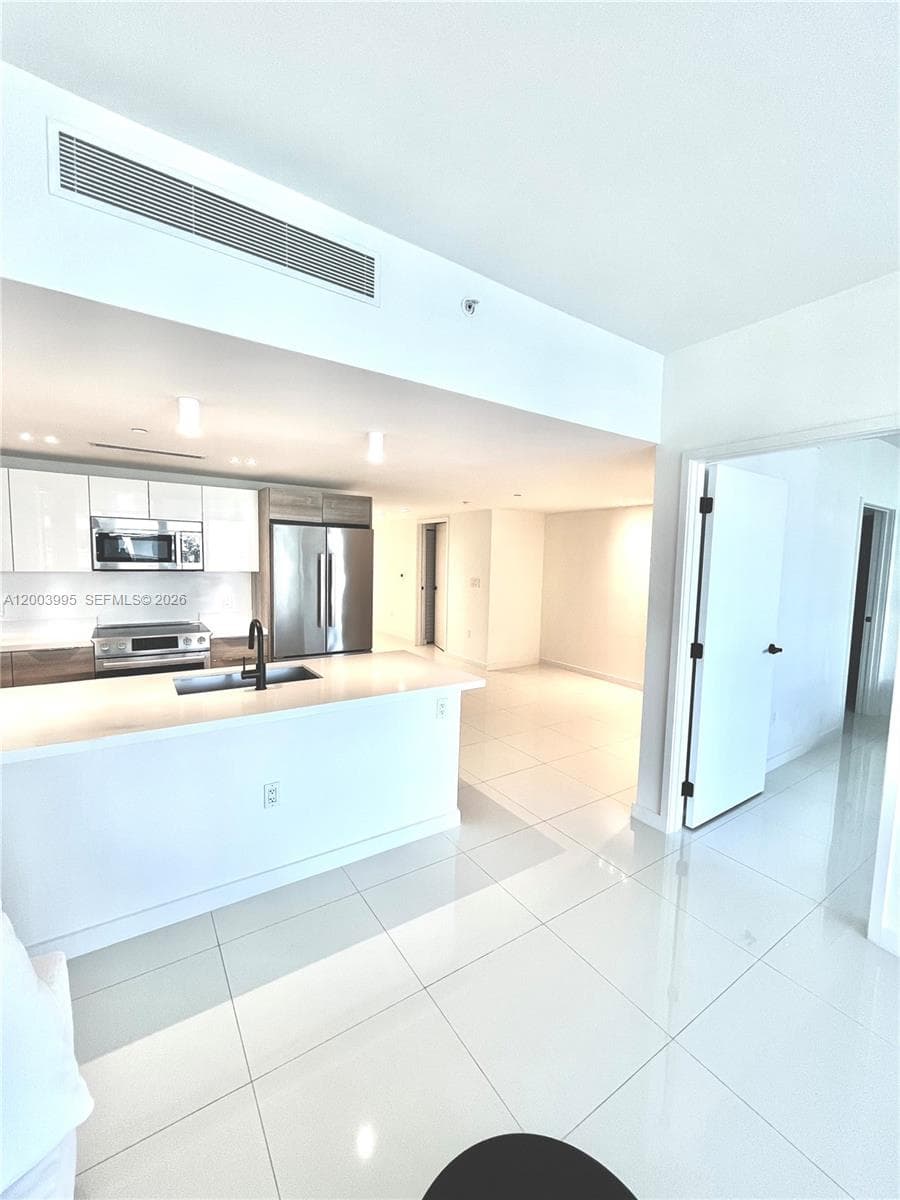 9940 W Bay Harbor Dr 5A-N photo 4