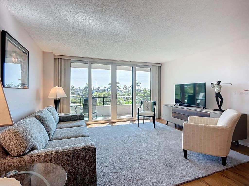 6415 MIDNIGHT PASS ROAD 306 photo 23