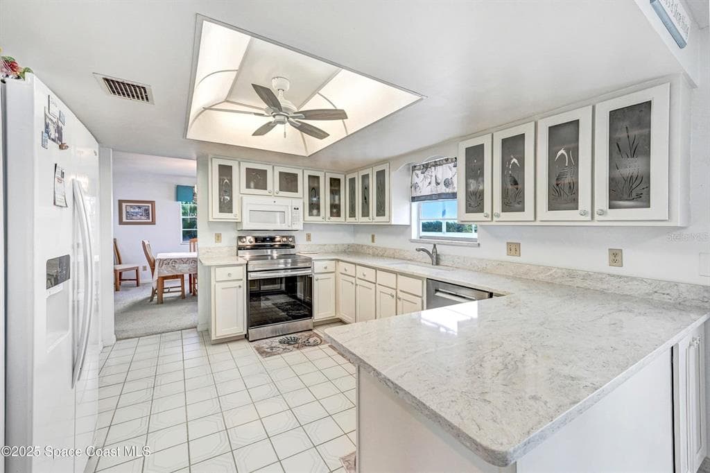 1440 SYKES CREEK DRIVE 4