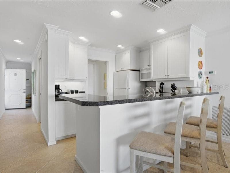 8911 MIDNIGHT PASS ROAD 208 photo 6