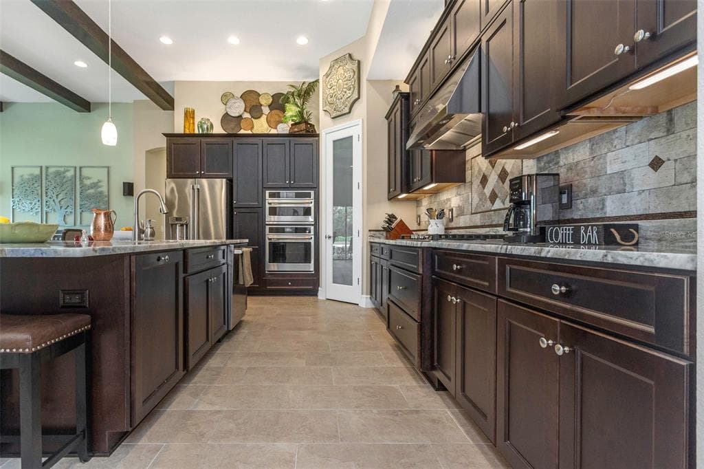 4239 WOODLAND RETREAT BOULEVARD photo 18