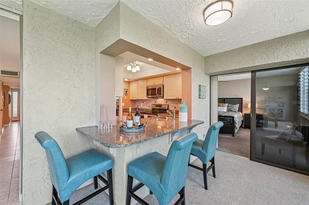 8710 MIDNIGHT PASS ROAD 203B photo 12
