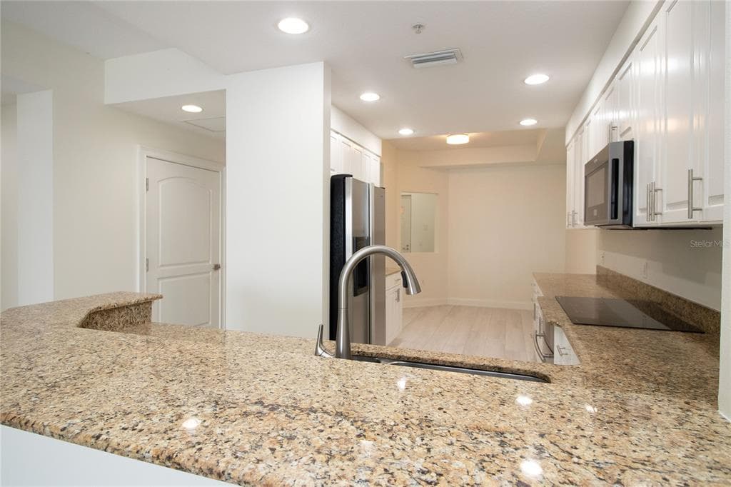 615 RIVIERA DUNES WAY 402 photo 14
