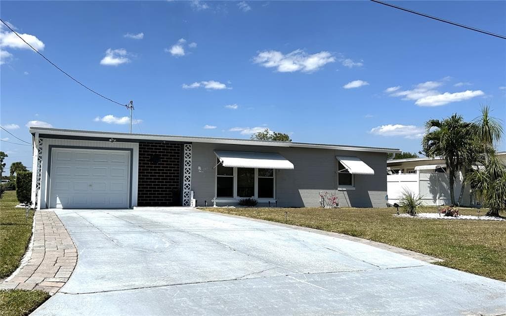 123 POINSETTIA CIRCLE NE 1