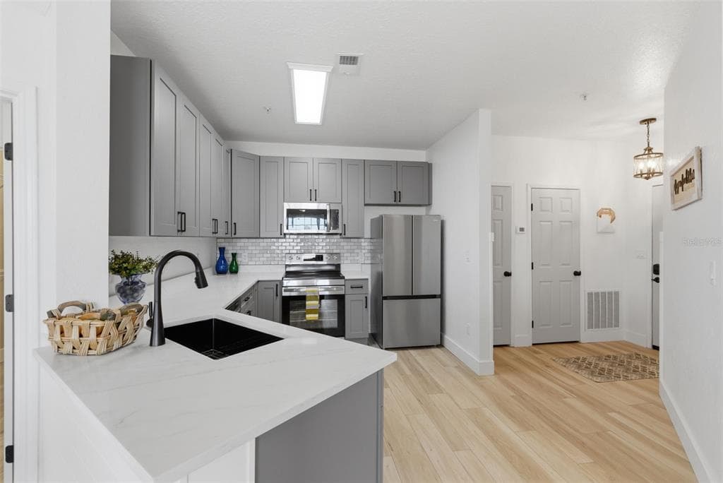4323 BAYSIDE VILLAGE DRIVE #312 2