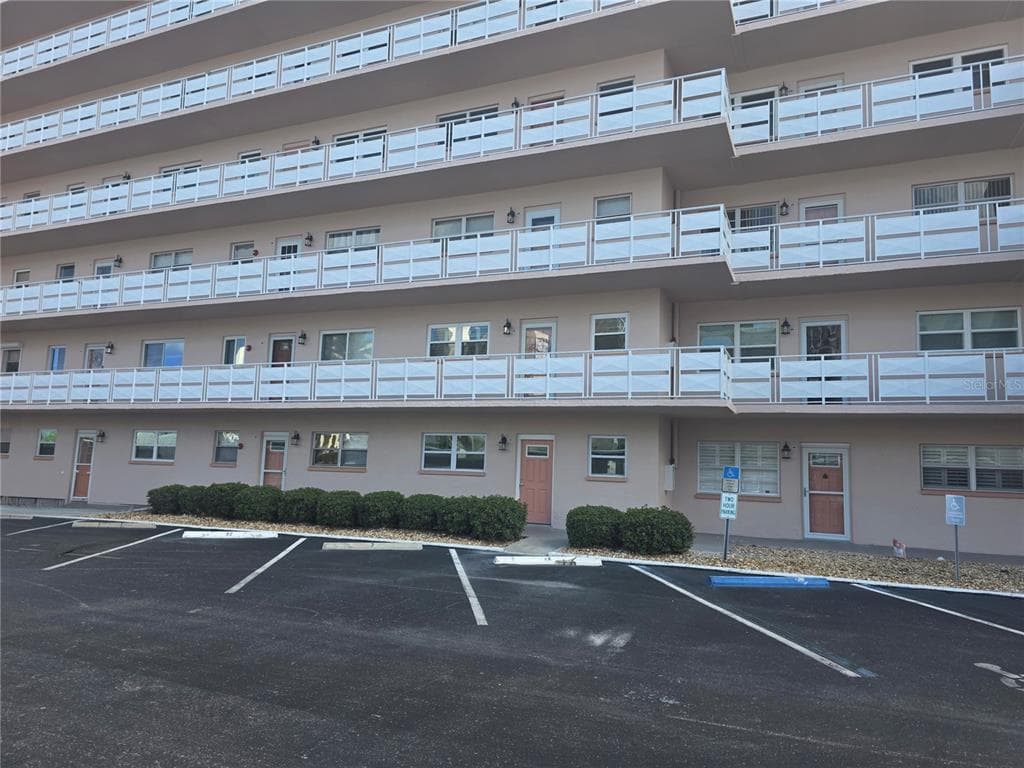 6025 SHORE BOULEVARD S 105 photo 1