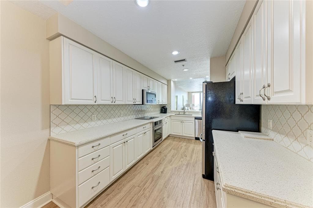 610 RIVIERA DUNES WAY 404 photo 17