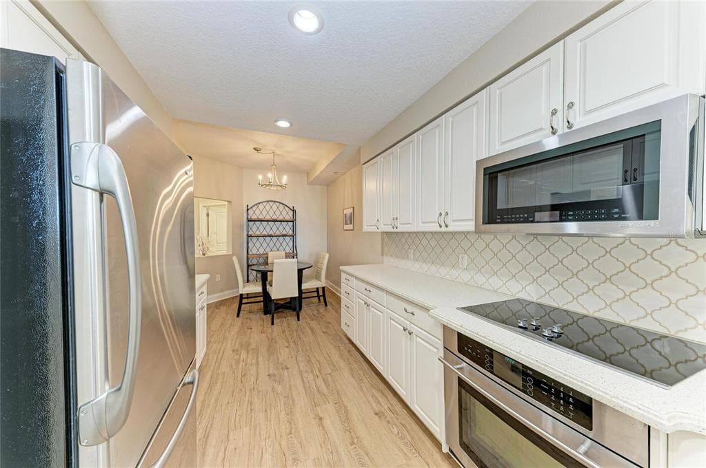 610 RIVIERA DUNES WAY 404 photo 16