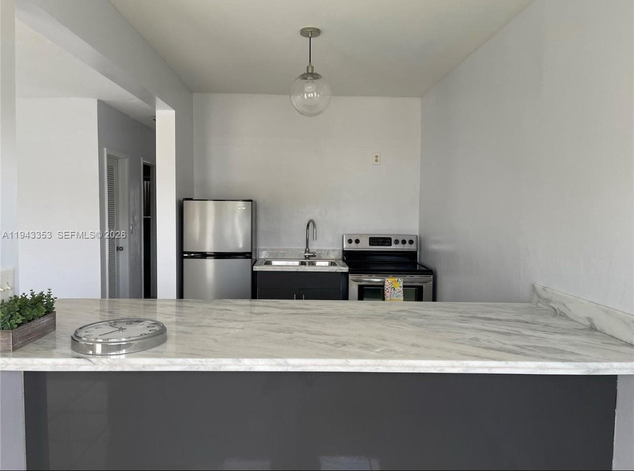 455 Golden Isles Dr 107 photo 3