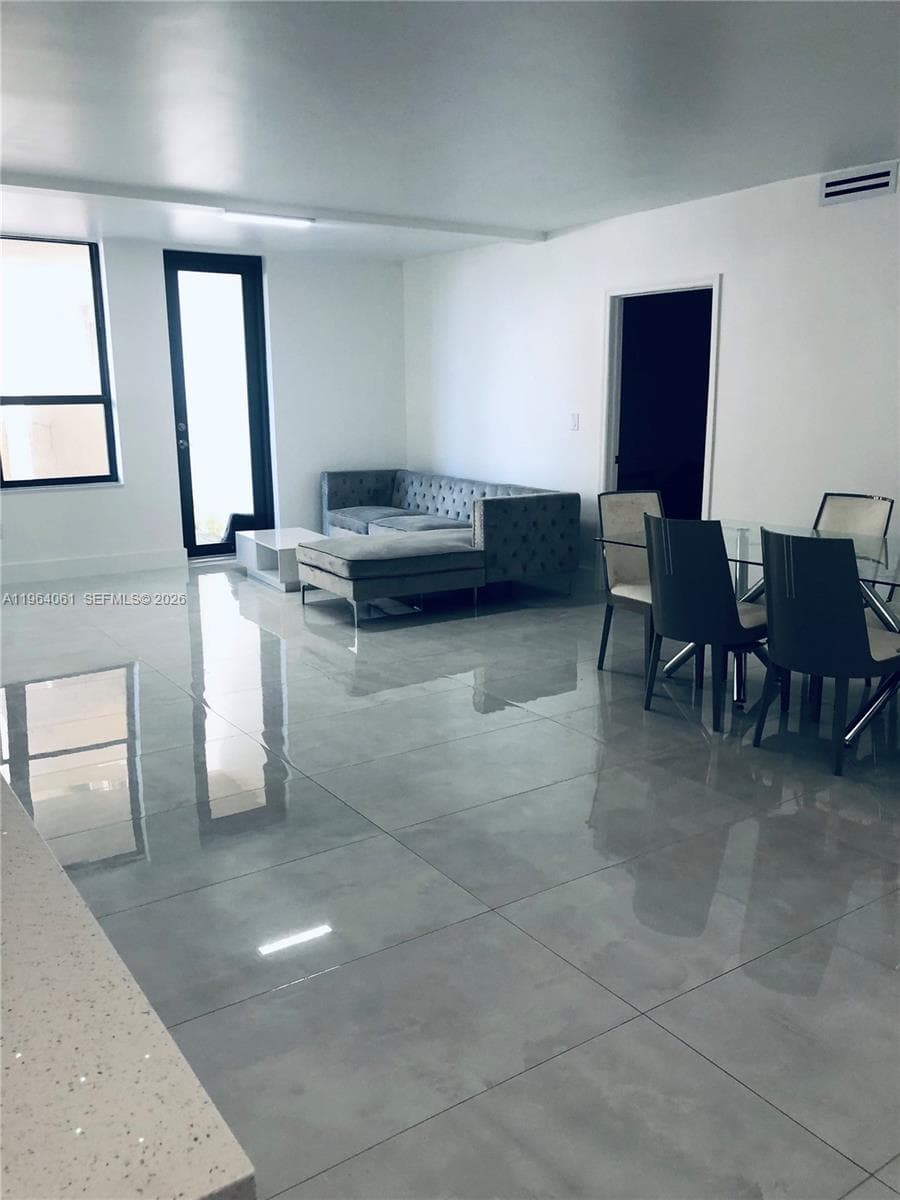 10185 Collins Ave 209 photo 1