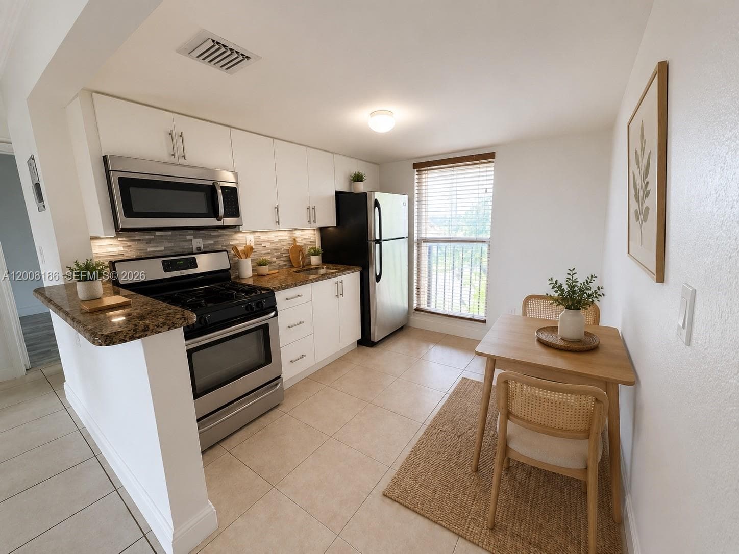 241 S Royal Poinciana Blvd 310 photo 3