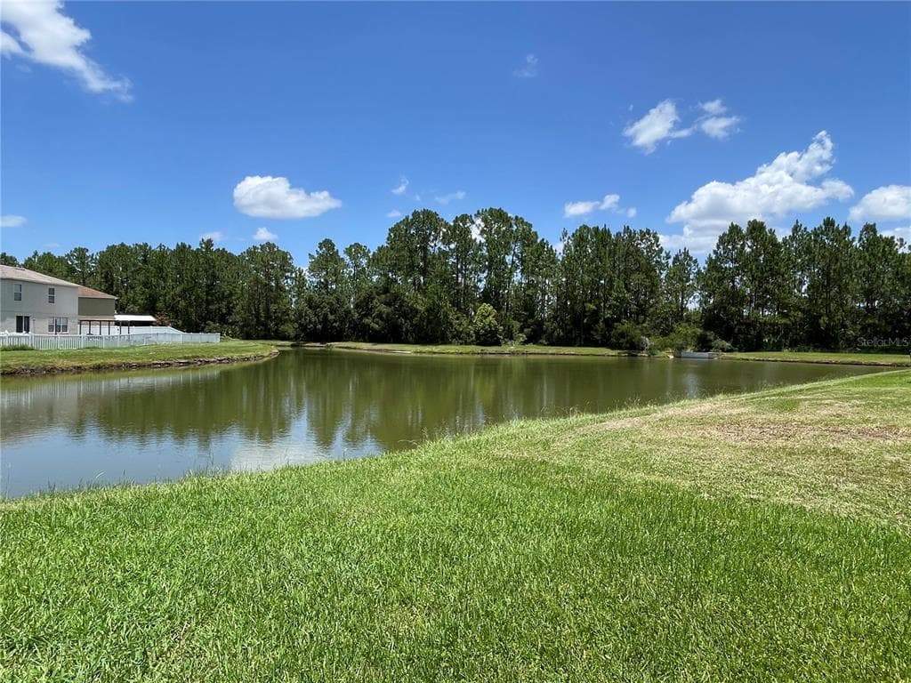 5036 WHISTLING PINES COURT photo 2